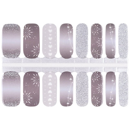 Grey and silver nail wraps with glitter, geometric patterns and metallic shimmer finish