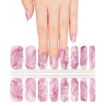 Pink marble nail wraps sheet showing dusty rose stone pattern for at-home manicure