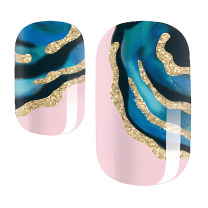 Blue marble nail wraps with gold glitter swirl pattern for at-home manicure