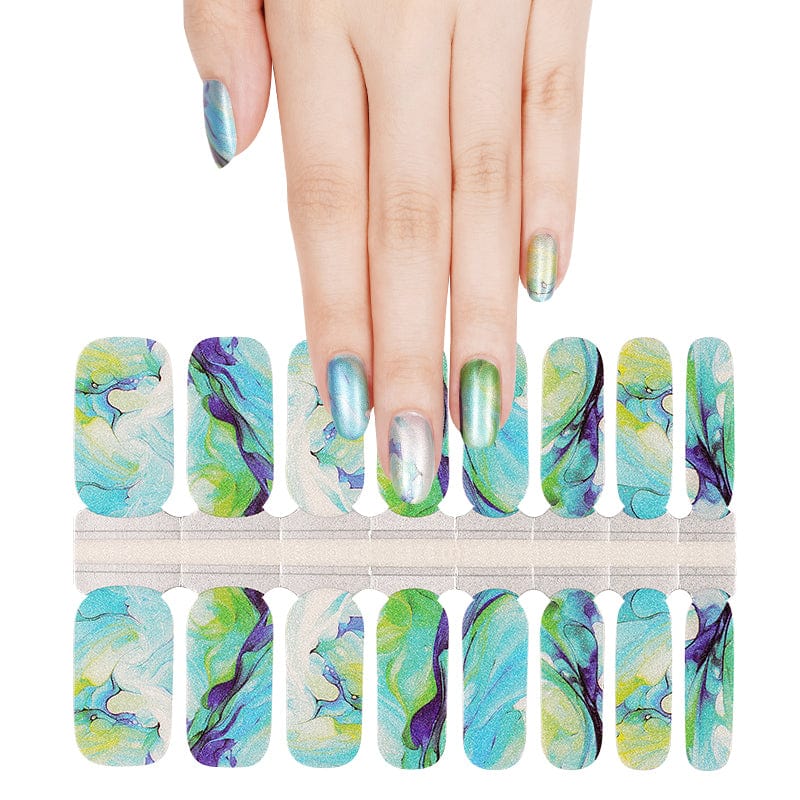 Blue green marble nail wraps displayed with hand showing turquoise water pattern manicure