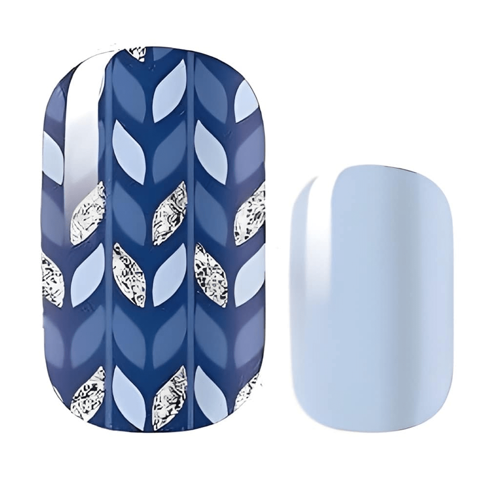 Blue and white leaf pattern nail wrap with geometric chevron design