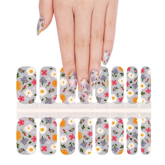 Non-UV nail wraps sheet displaying white floral pattern with multicoloured wildflower design