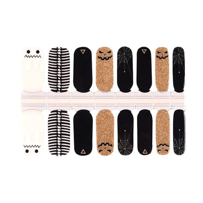 Complete Halloween nail wrap set with ghost, striped, black, and gold glitter designs