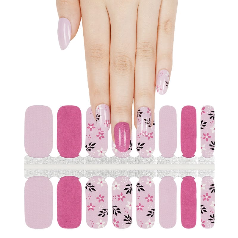 Pink floral nail wraps sheet showing botanical patterns for spring nail art