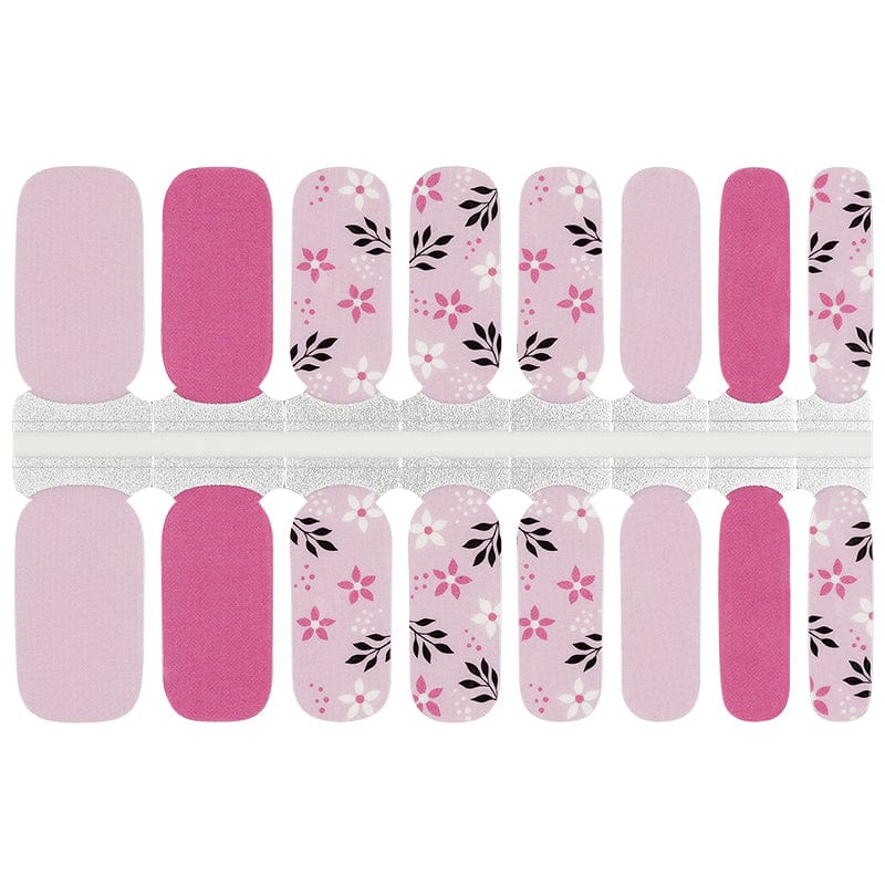 Pink floral nail wraps with delicate flower patterns and botanical designs for at-home manicures