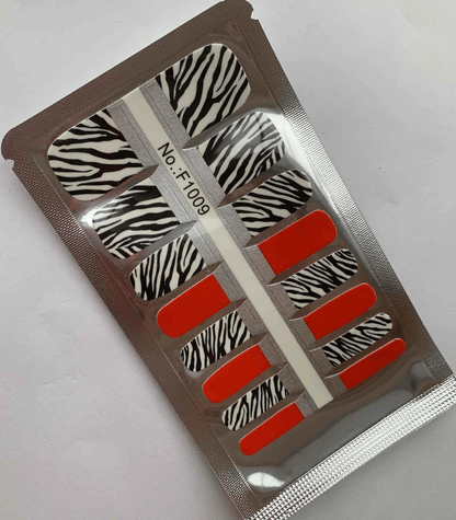Zebra safari pedicure nail wraps sheet with black white stripes and red accents