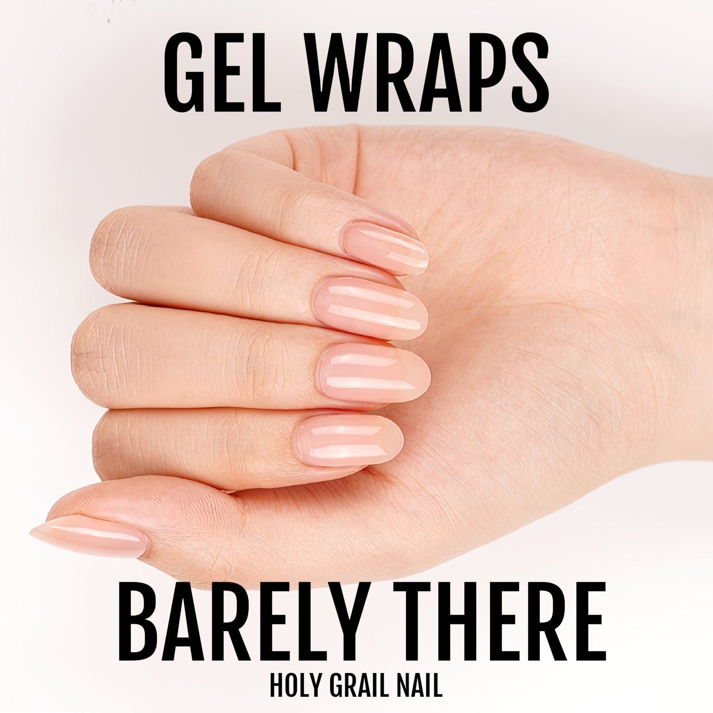 Barely there nude gel nail wraps on hand with natural pink tones