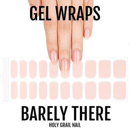 Natural nude gel nail wraps on hand showing barely there clear manicure finish