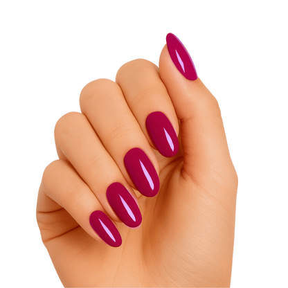 Bordeaux burgundy glossy gel nail wraps on hand showing deep red manicure