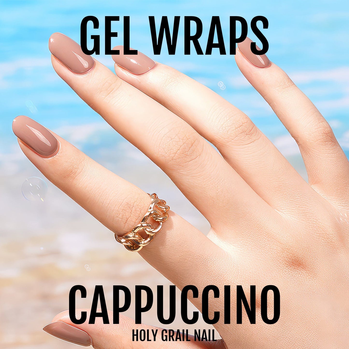 Cappuccino gel nail wraps on hand showing warm brown nude manicure with gold chain ring
