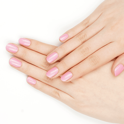 Both hands wearing pink glossy gel nail wraps in carnation shade for at-home nail art