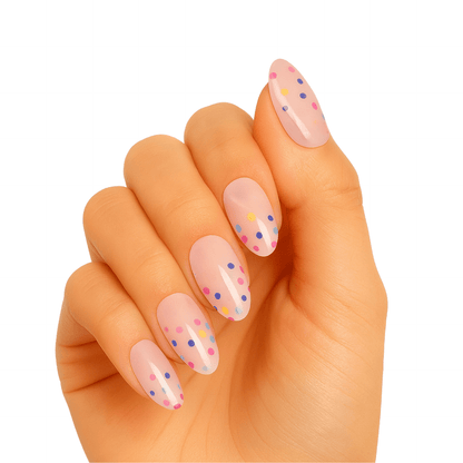 Pink gel nail wraps with colourful confetti dots pattern on hand