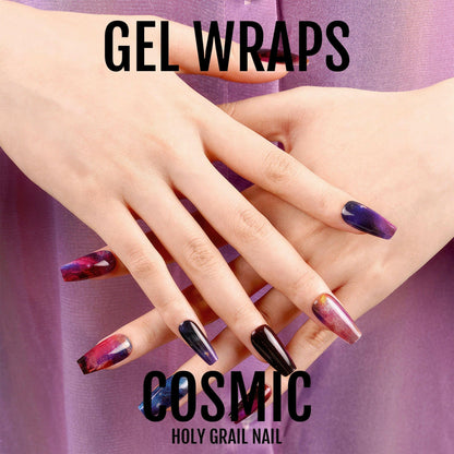 Hands displaying cosmic galaxy gel nail wraps in purple, black and multicoloured finishes