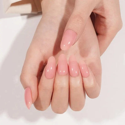 Cupped hands showing dusty rose pink gel nail wraps with natural glossy appearance