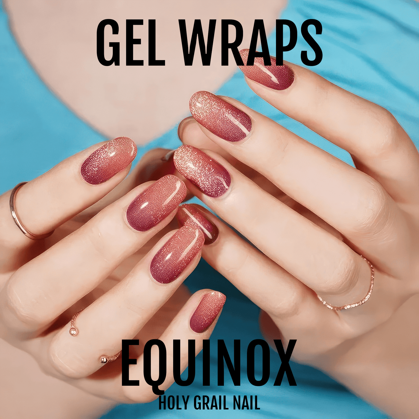 Pink rose gold metallic gel nail wraps on hands displaying glitter finish
