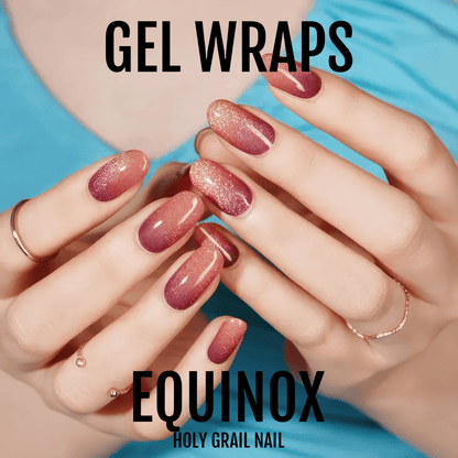 Pink rose gold metallic gel nail wraps on hands displaying glitter finish