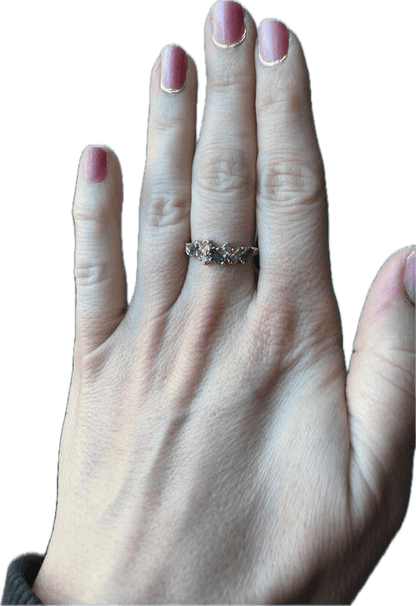 Hand wearing subtle pink gel nail wraps with glossy gradient ombré finish