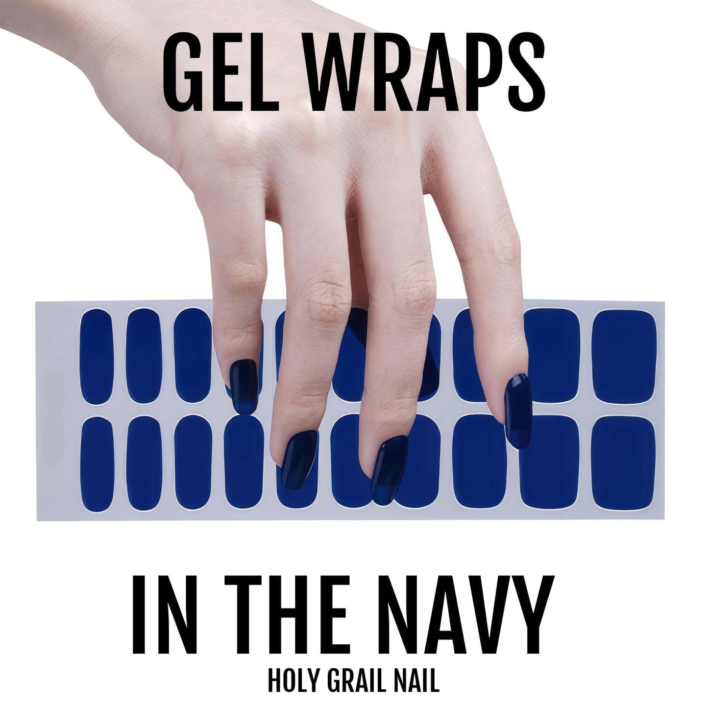 Hand selecting from navy blue gel nail wraps sheet for DIY manicure