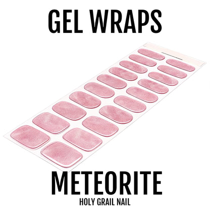Meteorite gel nail wraps sheet displaying pink purple glitter strips for at-home nail art