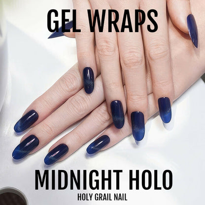 Dark navy holographic gel nail wraps on hand showing midnight blue shimmer finish
