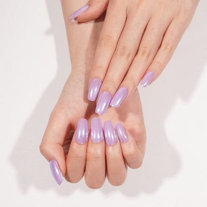 Hands showcasing purple chrome gel nail wraps with mirror finish reflecting light