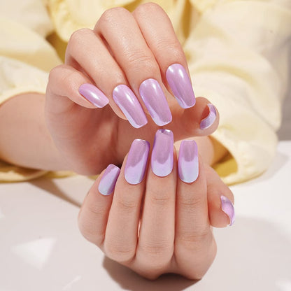 Lilac mirror gel nails on hands creating stunning chrome manicure with metallic shine