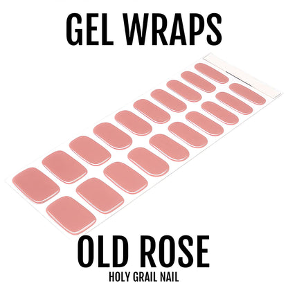 Semi-cured gel nail wraps in dusty pink old rose shade ready for application