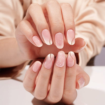 Romantic pink gel nails with pearl shimmer and French tips showcased on both hands