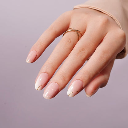 Elegant pink gel nail wraps with sparkle detail and white tips perfect for wedding manicure