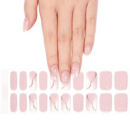 Hand showing pink glitter gel nail wraps with pearl shimmer effect