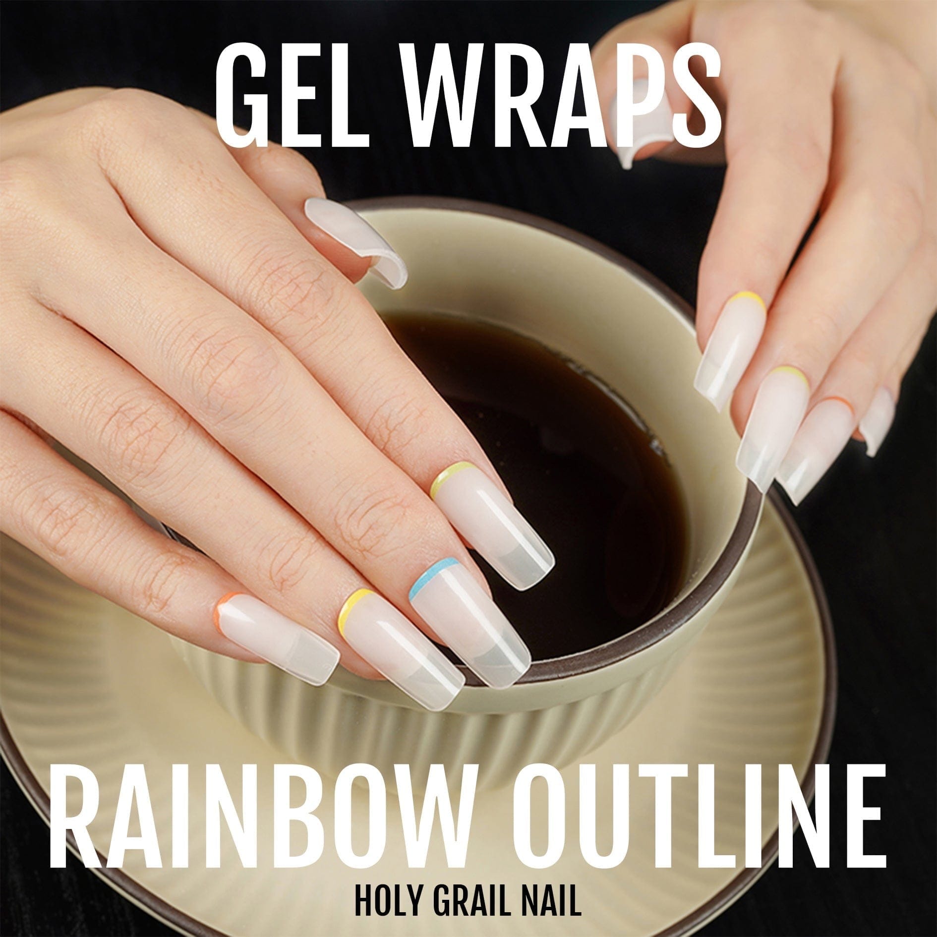 Rainbow outline gel nail wraps on hand holding mug showing colourful French tip manicure