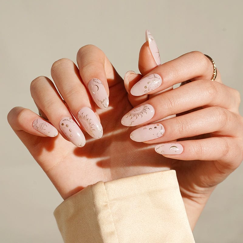 Mystical boho gel nails with metallic tarot and celestial designs on both hands