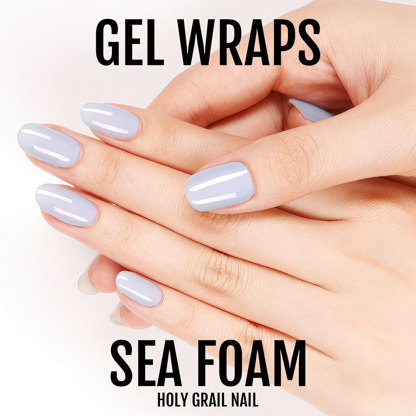 Light blue gel nail wraps on hand showing powder blue manicure finish