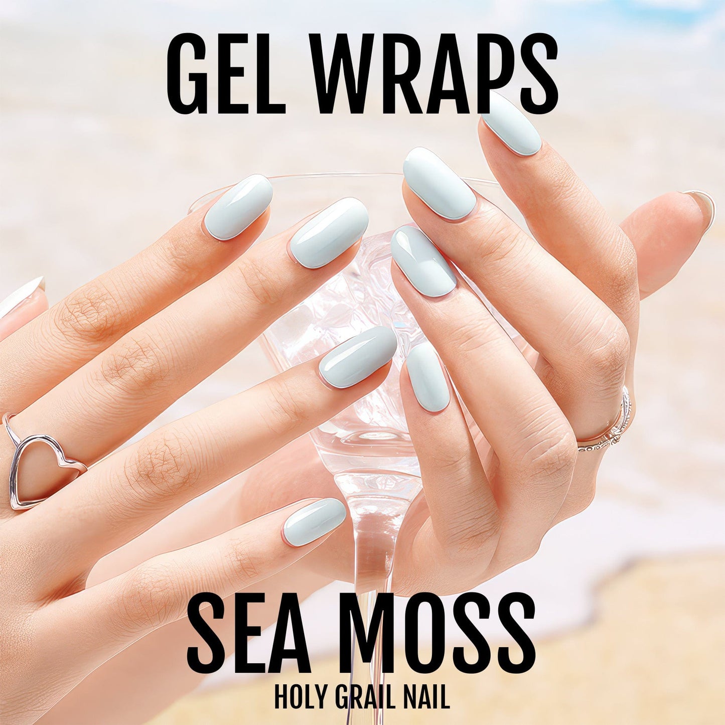 Sea moss blue gel nail wraps displayed on hands with glossy powder blue finish