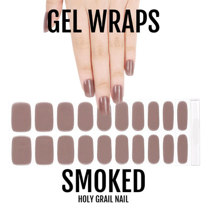 Hand with smoked taupe gel nail wraps and full set showing brown neutral colours