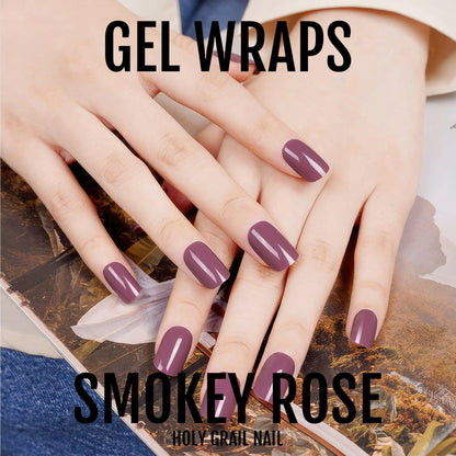 Mauve gel nail wraps on fingers showing sophisticated purple nail design
