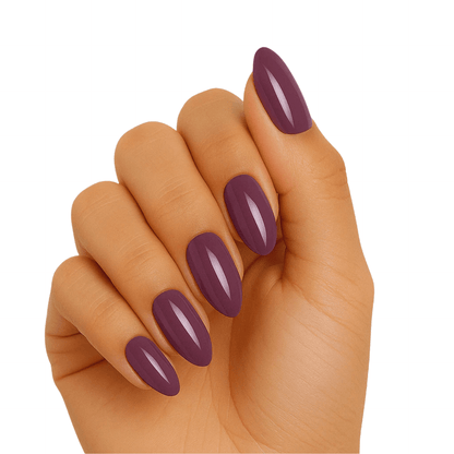 Smoky rose purple gel nail wraps on hand showing glossy mauve finish