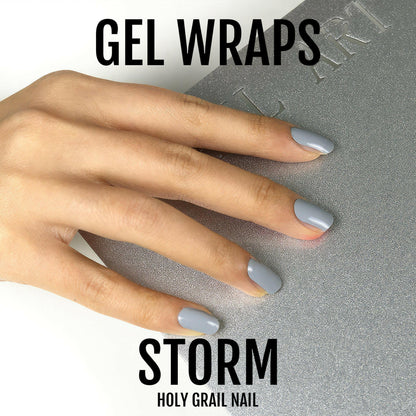 Professional storm grey gel nail wraps on elongated nails for sleek manicure