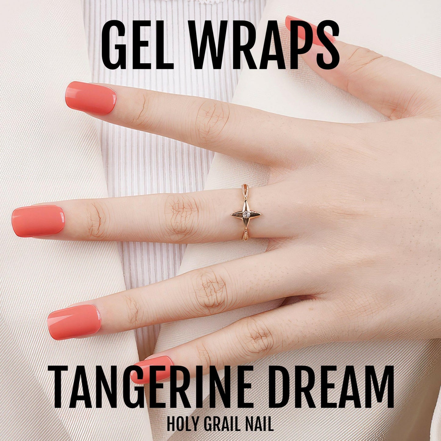 Vibrant coral orange gel nail wraps on hand showing glossy tangerine manicure