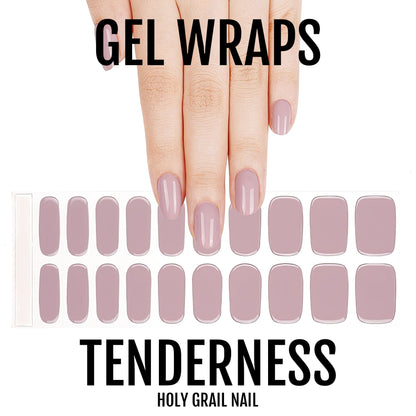 Mauve gel nail wraps on hand showing sophisticated dusty pink at-home manicure