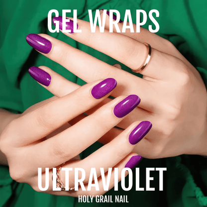 Hands displaying purple gel nail wraps with shimmery metallic ultraviolet finish