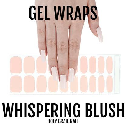 Soft pink gel nail wraps on hand showing nude blush manicure for elegant nail art