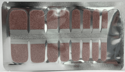 Pink glitter pedicure nail wraps in packaging for at-home foot manicure